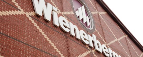 Production plant in Hennersdorf, plant in Hennersdorf, Logo on building wall