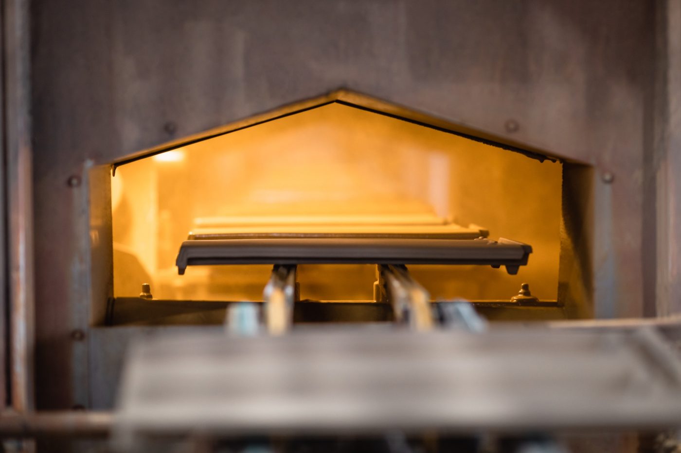 Raw roof tiles in the tunnel dryer